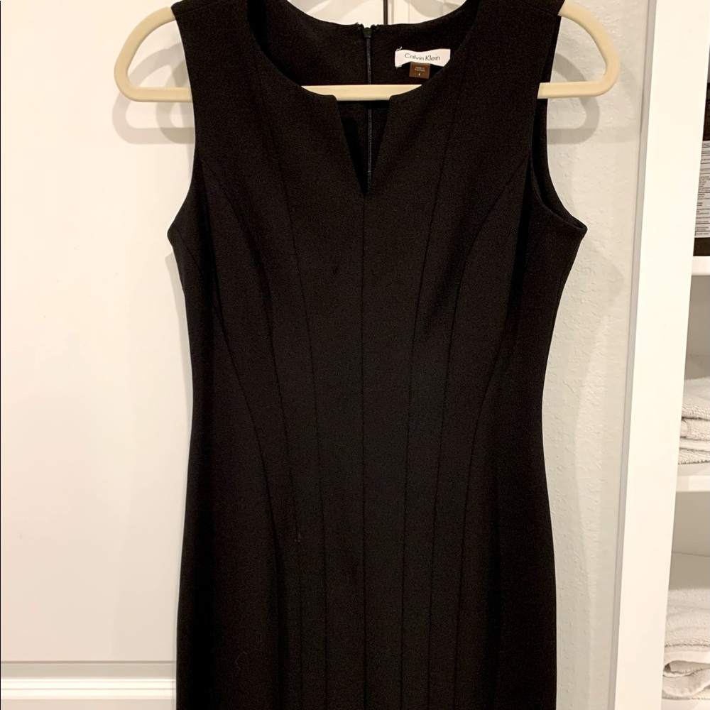 Flattering black Calvin Klein dress. Size 4.